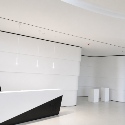Recepción con mostrador y paredes en Solid Surface — Fábrica Sesderma